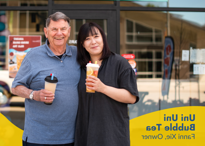 Fanni Xie owner of Uni Uni Bubble Tea in front of bubble tea shop with her SCORE Mentor 